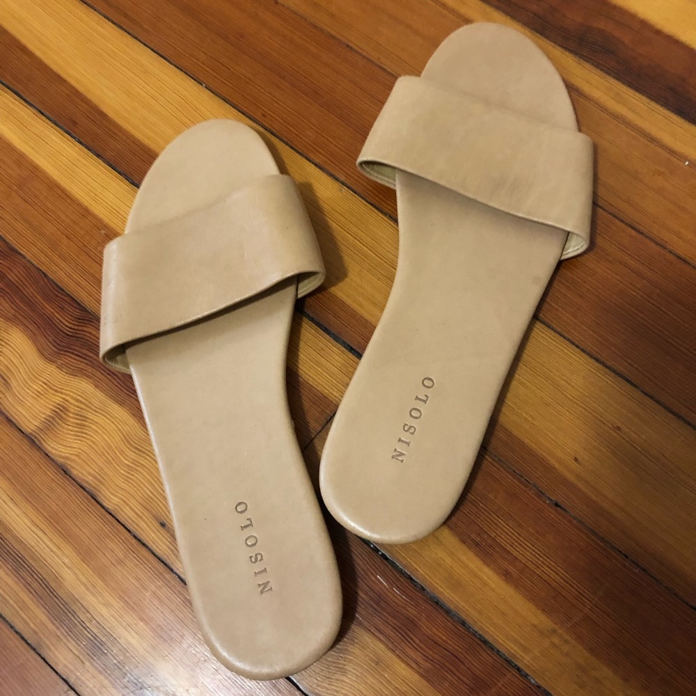 Almost new cream leather slides. Classic.